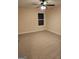 Well-lit bedroom with neutral carpeting and ceiling fan at 200 Parker Dr, Mcdonough, GA 30253