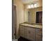 Modern bathroom with granite countertop and white cabinets at 200 Parker Dr, Mcdonough, GA 30253