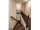 Upstairs hallway with view of second staircase and bedrooms at 200 Parker Dr, Mcdonough, GA 30253