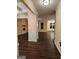 View of entryway with dark hardwood floors and white wainscoting at 200 Parker Dr, Mcdonough, GA 30253