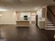 Open concept kitchen with island, stainless steel appliances, and white cabinets at 200 Parker Dr, Mcdonough, GA 30253