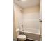 Clean bathroom with a bathtub and shower at 200 Parker Dr, Mcdonough, GA 30253