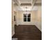 Bright dining room with a chandelier and large window at 200 Parker Dr, Mcdonough, GA 30253