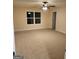 Spacious bedroom with neutral carpeting and ceiling fan at 200 Parker Dr, Mcdonough, GA 30253