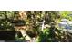 View from stairs down to backyard with trees and pathway at 5260 Island Dr, Stone Mountain, GA 30087