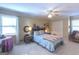 Comfortable bedroom with a queen-size bed and plenty of natural light at 5260 Island Dr, Stone Mountain, GA 30087