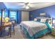 Bright bedroom with a king-size bed and a calming blue color scheme at 5260 Island Dr, Stone Mountain, GA 30087