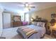 Spacious bedroom with carpeted floors and plenty of natural light at 5260 Island Dr, Stone Mountain, GA 30087