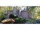 Two-story house with gray siding and a large yard at 5260 Island Dr, Stone Mountain, GA 30087