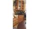 Kitchen with corner cabinet, breakfast nook and granite countertop at 5260 Island Dr, Stone Mountain, GA 30087