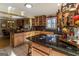 Large kitchen with granite countertops and an abundance of cabinets at 5260 Island Dr, Stone Mountain, GA 30087