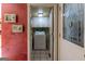 Convenient laundry room with washer, dryer, and built-in cabinets at 5260 Island Dr, Stone Mountain, GA 30087