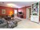 Spacious living room with sectional sofa and built-in shelving at 5260 Island Dr, Stone Mountain, GA 30087