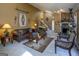 Living room with fireplace and leather furniture at 5260 Island Dr, Stone Mountain, GA 30087