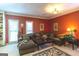 Living room featuring a sectional sofa and a warm color palette at 5260 Island Dr, Stone Mountain, GA 30087