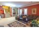 Open living area with sectional sofa and access to the staircase at 5260 Island Dr, Stone Mountain, GA 30087