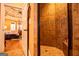 Large walk-in shower with tile surround and built-in seat at 197 Westbrook Rd, Carrollton, GA 30116