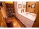 Bathroom with a vanity, shower, and decorative accents at 197 Westbrook Rd, Carrollton, GA 30116