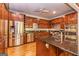 Kitchen with stainless steel appliances and granite countertops at 230 Haynes Rd, Moreland, GA 30259