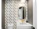 Modern bathroom with geometric tile and a sleek vanity at 595 Sherwood Ne Rd, Atlanta, GA 30324