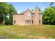 Two story house with backyard and large green space at 920 Eskew Rd, Mcdonough, GA 30252