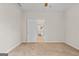 Simple bedroom with carpet flooring and access to a bathroom at 920 Eskew Rd, Mcdonough, GA 30252