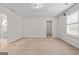 Bright bedroom featuring a walk-in closet and bathroom access at 920 Eskew Rd, Mcdonough, GA 30252