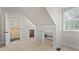 Bedroom with built-in shelving and access to a small bathroom at 920 Eskew Rd, Mcdonough, GA 30252