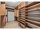 Spacious walk-in closet with ample shelving and hanging space at 920 Eskew Rd, Mcdonough, GA 30252