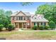 Two-story brick home with landscaping at 920 Eskew Rd, Mcdonough, GA 30252