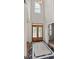 Elegant entry with double doors, marble flooring, and high ceilings at 920 Eskew Rd, Mcdonough, GA 30252
