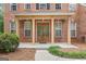 Front entrance with double doors and porch at 920 Eskew Rd, Mcdonough, GA 30252