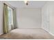 Bright bedroom featuring carpet flooring, a window with curtains, and a closet at 920 Eskew Rd, Mcdonough, GA 30252