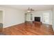 Bright living room with hardwood floors, fireplace, and ceiling fan at 155 Castleair Ct. Ne, Kennesaw, GA 30144