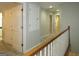 Upstairs hallway with carpeting and access to bedrooms at 5335 Saville Dr, Acworth, GA 30101