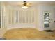 Bright breakfast nook with bay window, plantation shutters, and tile flooring at 5335 Saville Dr, Acworth, GA 30101