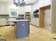 Island kitchen with stainless steel appliances and granite countertops at 5335 Saville Dr, Acworth, GA 30101