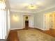Spacious living room with hardwood floors and views into Gathering room at 5335 Saville Dr, Acworth, GA 30101