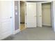 Bedroom with doors leading to other rooms and a closet at 5335 Saville Dr, Acworth, GA 30101