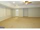 Finished basement with ceiling fan and exterior access at 5335 Saville Dr, Acworth, GA 30101