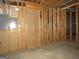 Unfinished basement area with framed walls and electrical panel at 5335 Saville Dr, Acworth, GA 30101