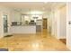 Modern kitchen with island, stainless steel appliances, and tile flooring at 5335 Saville Dr, Acworth, GA 30101
