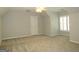 Bright bedroom with neutral walls and carpet at 5335 Saville Dr, Acworth, GA 30101