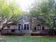 Brick house back with deck and landscaping at 5335 Saville Dr, Acworth, GA 30101