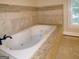 Relaxing bathroom with a large jetted tub at 5335 Saville Dr, Acworth, GA 30101