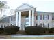 Brick house with columns, a grand entrance and manicured landscaping at 5335 Saville Dr, Acworth, GA 30101