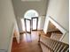 Two-story entryway with hardwood floors and an arched door at 5335 Saville Dr, Acworth, GA 30101