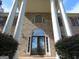 Elegant front entrance with columns and ornate double doors at 5335 Saville Dr, Acworth, GA 30101