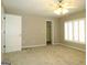 Spacious bedroom with carpet, ceiling fan, and window shutters at 5335 Saville Dr, Acworth, GA 30101