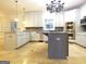 Large kitchen with granite countertops, stainless steel appliances and an island at 5335 Saville Dr, Acworth, GA 30101
